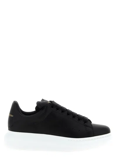 Alexander Mcqueen Women Black Low Top Sneakers With Logo Lettering On Tongue And Heel In Leather Wom In Black