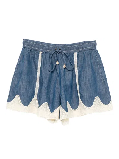 Zimmermann Awaken Lace-trimmed Denim Shorts In Blue