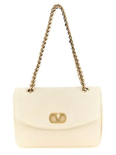 Valentino Garavani  Garavani Djuna Medium Chain Bag In Nappa Leather Woman Butter Uni