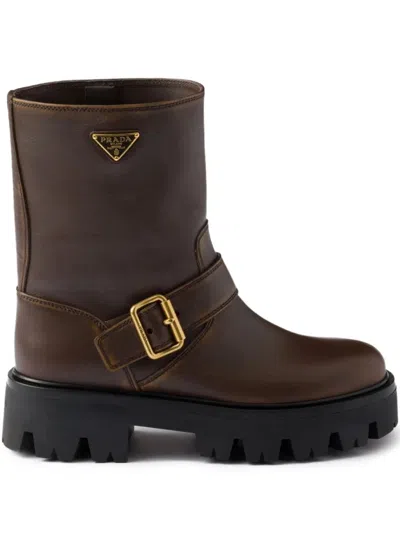Prada Triangle Logo Distressed Leather Ankle Boots In Brown