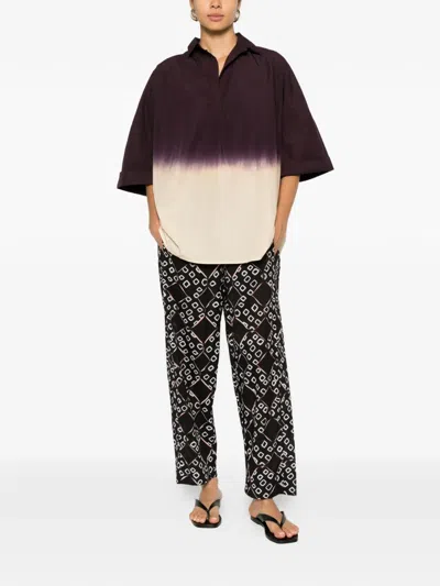 Yavi Geometric-pattern Trousers In Black