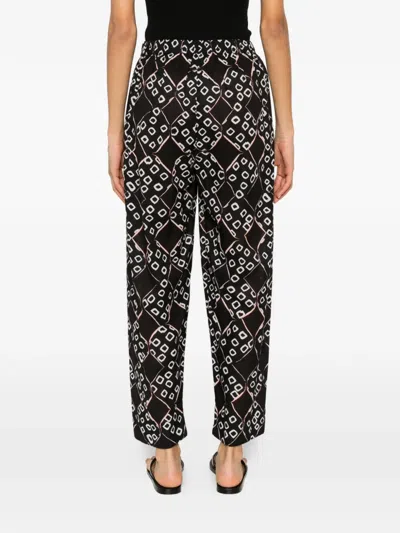 Yavi Geometric-pattern Trousers In Black