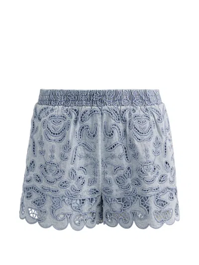 Alice And Olivia Kenley Eyelet Drawstring Denim Shorts Sierra Light Blue In Blue