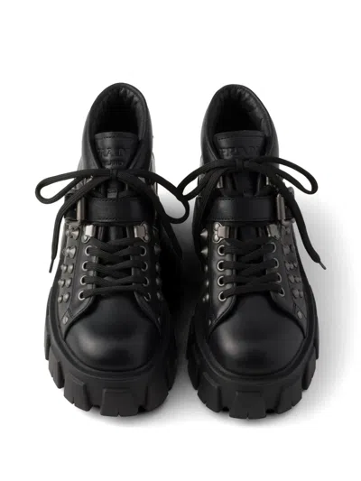 Prada Monolith Studded Leather Booties In Black