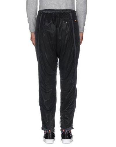 Shop Adidas By Kolor Casual Pants In Black