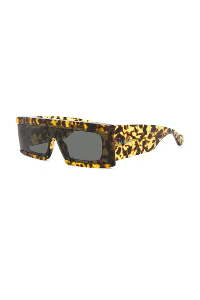 Alaïa Cut Rectangular Sunglasses In Brown