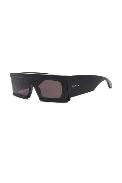 Alaïa Cut Rectangular Sunglasses In Green