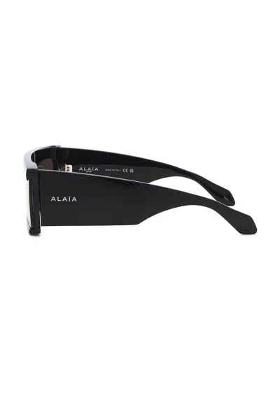 Alaïa Cut Rectangular Sunglasses In Green
