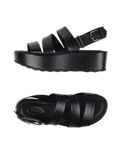 Shop Tod's Sandals In Black