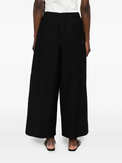 Totême Drawstring Patch-pocket Trousers In Black