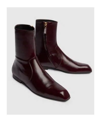 Khaite Colt Glossed Leather Ankle Boots In Burgundy