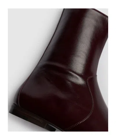 Khaite Colt Glossed Leather Ankle Boots In Burgundy