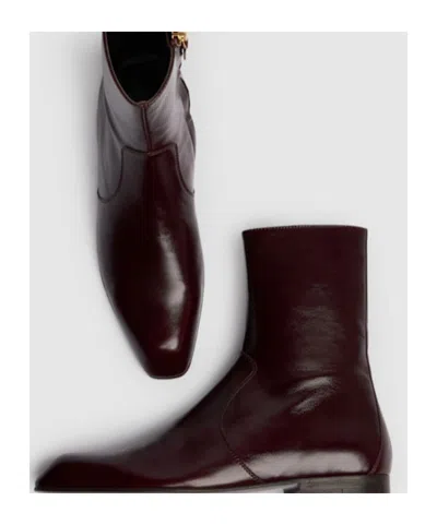 Khaite Colt Glossed Leather Ankle Boots In Burgundy