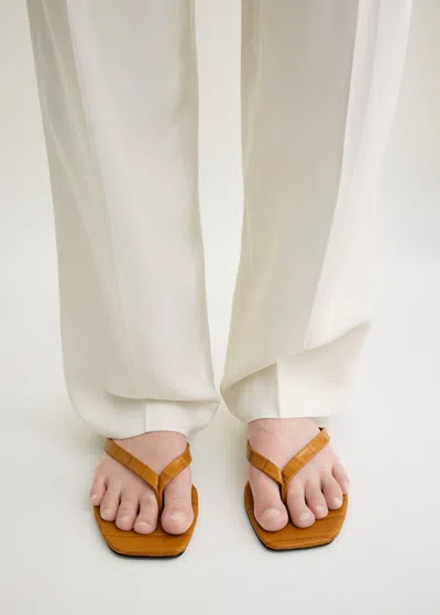 Totême Toteme Crocodile-effect Leather Flip Flops In Orange