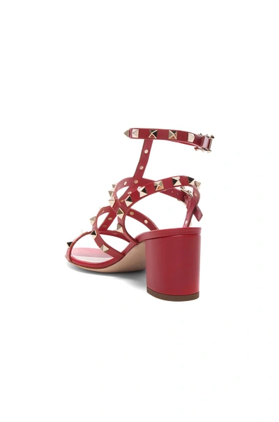 Shop Valentino Rockstud Sandal In Red