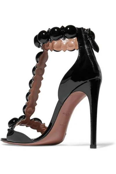 Shop Alaïa Studded Patent-leather Sandals