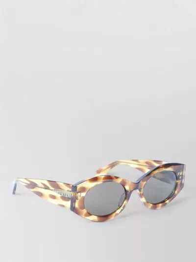 Alaïa Acetate Oval Frame Patterned Sunglasses In Brown