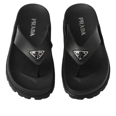 Prada Triangle Logo Rubber Thong Sandals In Black