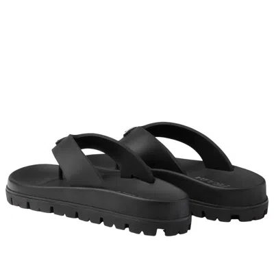 Prada Triangle Logo Rubber Thong Sandals In Black