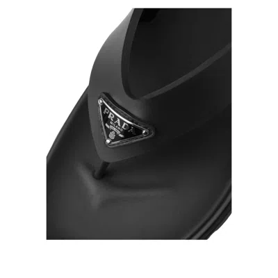 Prada Triangle Logo Rubber Thong Sandals In Black