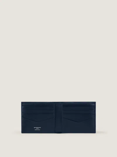 Givenchy Embossed Logo Flap Wallet In Blue
