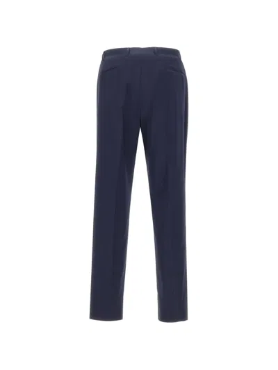 Corneliani Pleated-front Trousers In Blue