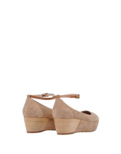 Shop Tod's Pumps In Khaki