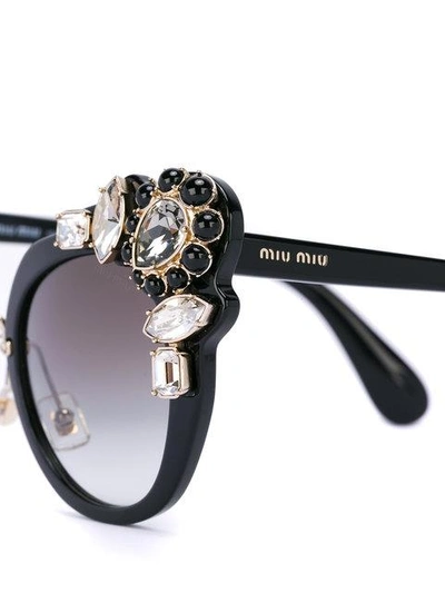 Shop Miu Miu Cat Eye Sunglasses