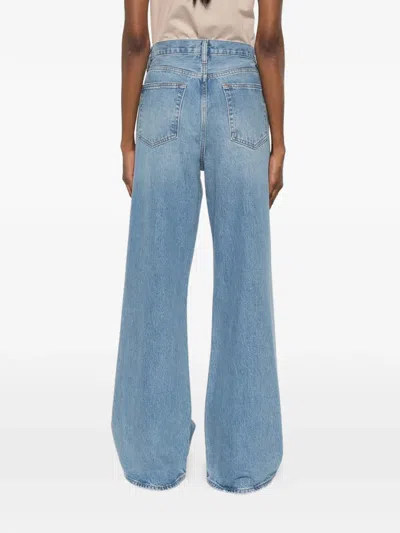 Frame The Loose Distressed Mid-rise Straight-leg Jeans In Blue