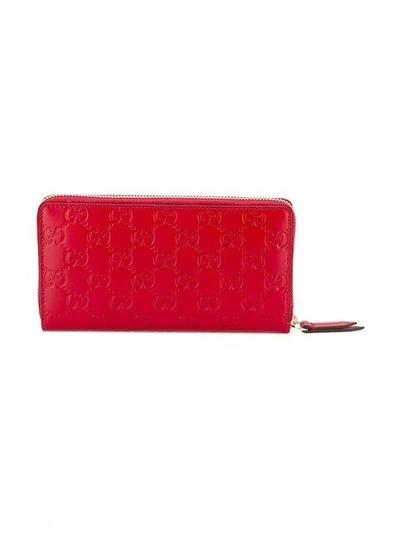 Shop Gucci Signature Zip Around Wallet