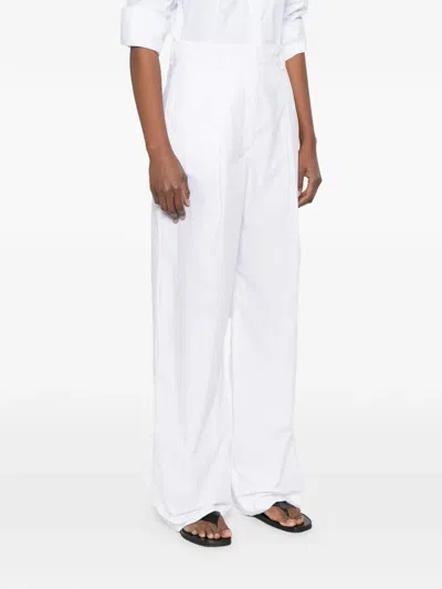 The Latest `axel` Pants In White