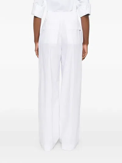 The Latest `axel` Pants In White