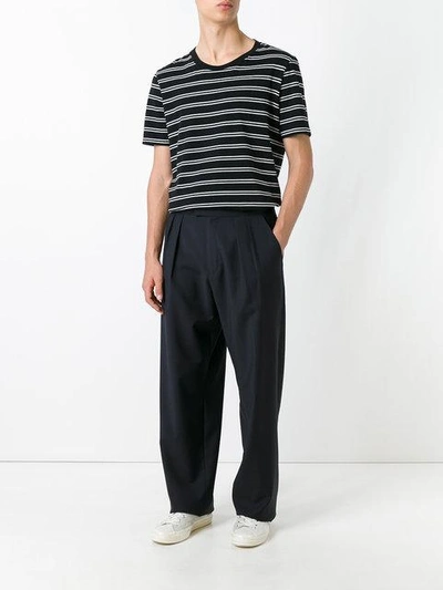 Shop Raf Simons Wide-legged Pleated Trousers