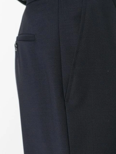 Shop Raf Simons Wide-legged Pleated Trousers