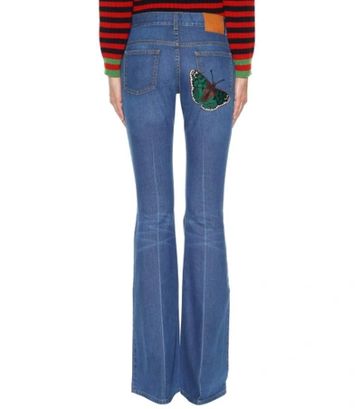 Shop Gucci Embroidered Flared Jeans In Llue