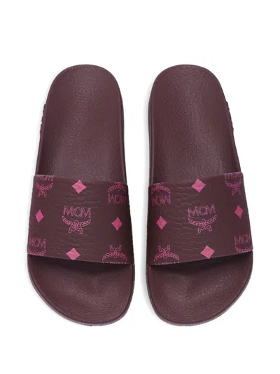 Mcm Monogram Print Rubber Slides In Brown