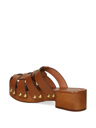 Bibi Lou Zue Studded Clogs In Brown