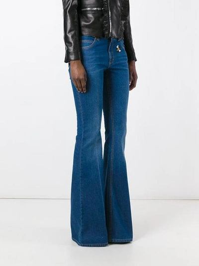 Shop Gucci Embroidered Flared Denim Jeans In Blue