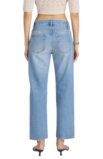 Frame The Loose Distressed Mid-rise Straight-leg Jeans In Blue
