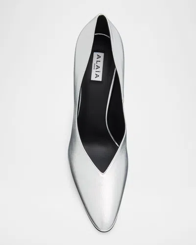 Alaïa Cone Pumps In Laminated Leather In Gray
