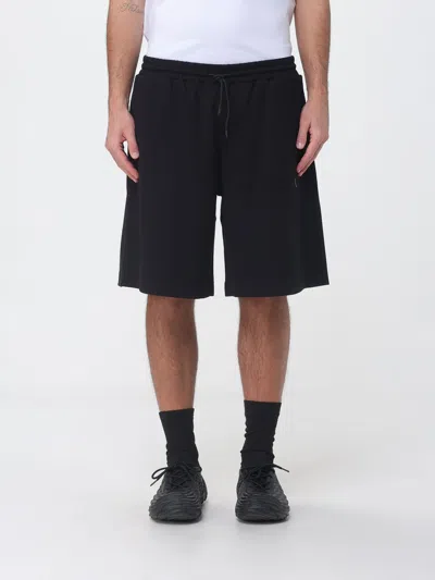 Msgm Shorts Men  In Black