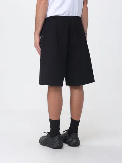 Msgm Shorts Men  In Black