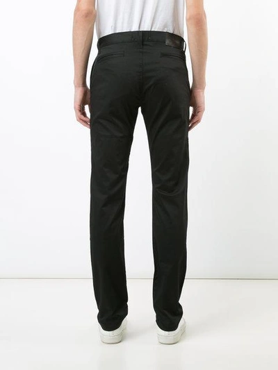 Shop Naked And Famous Skinny Trousers - Black
