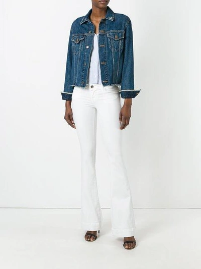Shop J Brand Flared Low-rise Jeans In White
