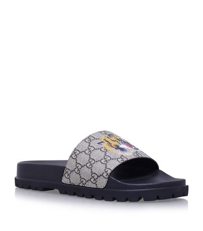 tiger print gucci slides