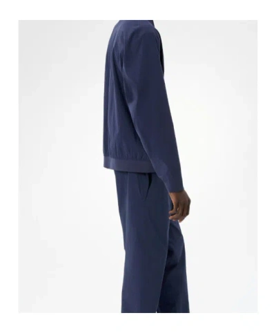 Veilance Diode Stretch Nylon Bomber Jacket In Blue