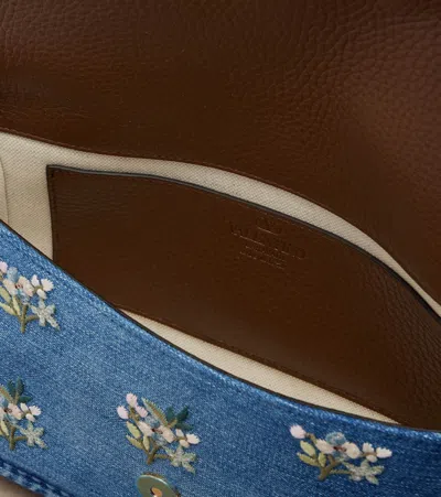 Valentino Alltime Medium Embroidered Denim Shoulder Bag With Embroidered Ribbon Strap In Blue