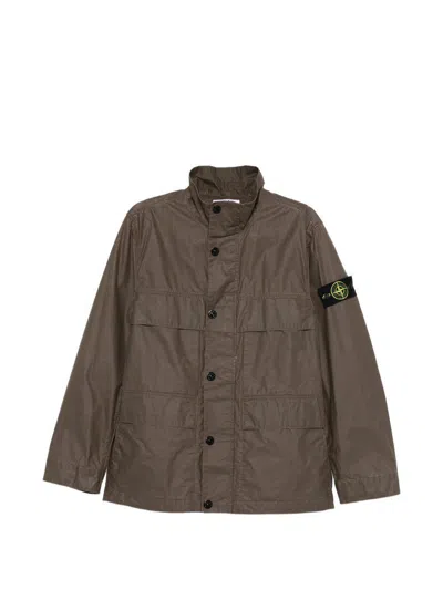 Stone Island Field Jacket With Pigmented Wax Coating In Brown