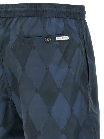DIAMOND-PATTERN SWIM SHORTS