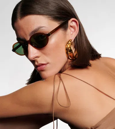Saint Laurent Monogram Oval Sunglasses In Pattern